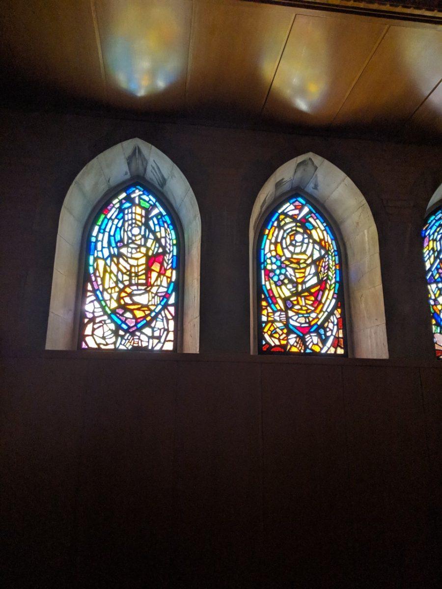 Stained glass windows in the Abbey Crypt, where part of the conference will be held. Photo by Brendan Gainer