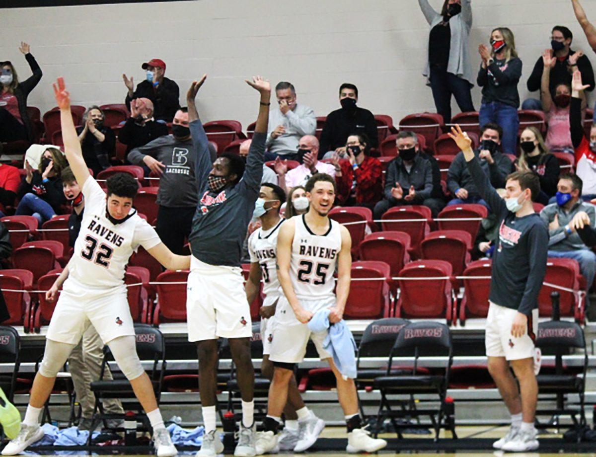 Benedictine's bench reacts during the Heart Semifinals against Mount Mercy on Feb. 27. Photo by Jason Nick