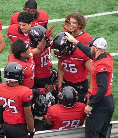 Dapkus being congratulated by his teammates 