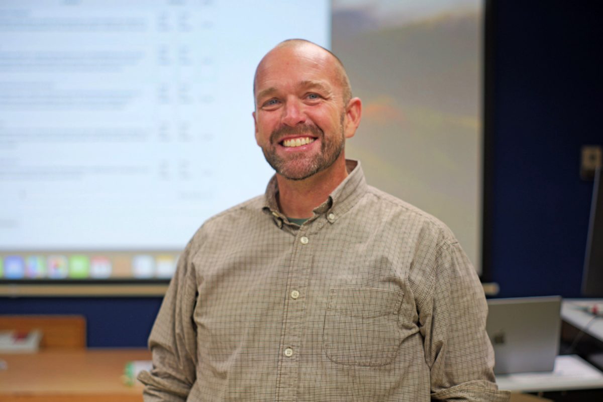 Professor Kyle Berlanger at home in the Journalism and Mass Communications media lab