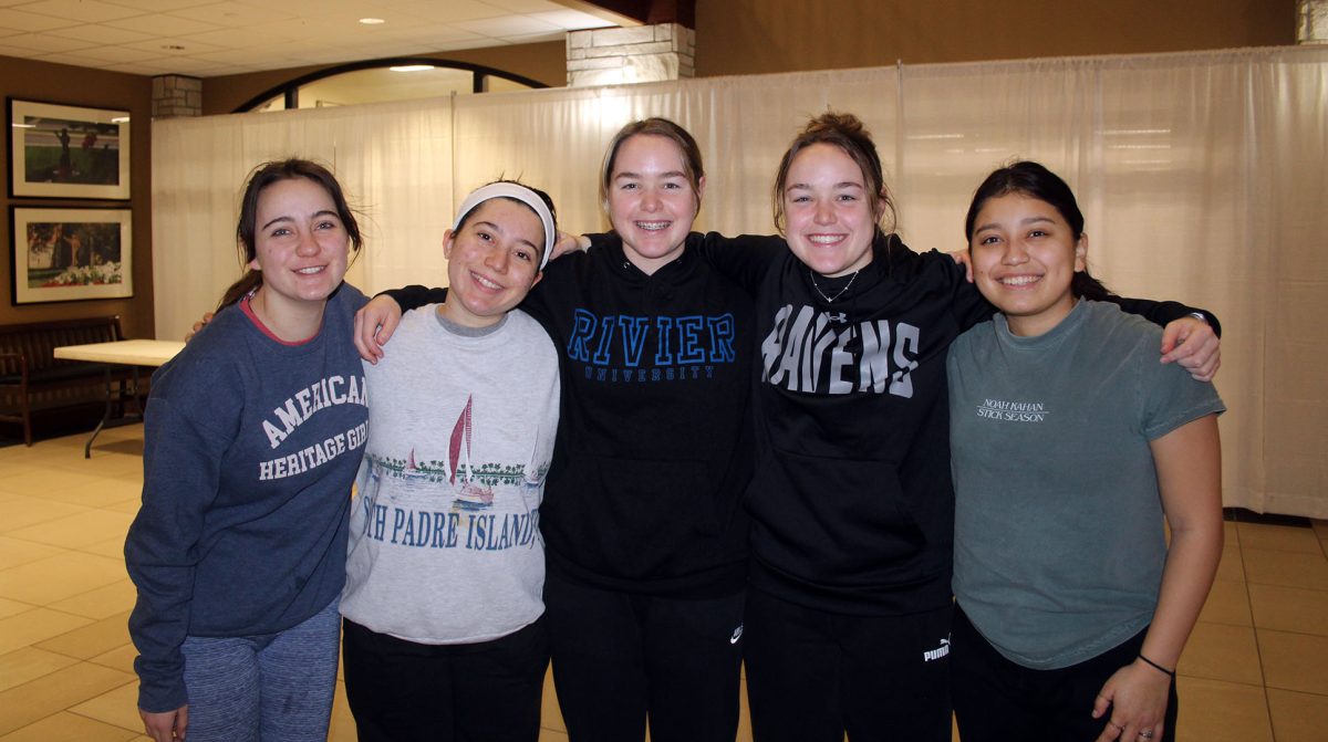 Left to Right: Alexis Lange, Jessica Mannella, Maureen Duffy, Patti Duffy and Julia Donovan pose before a training session early Friday morning.  

 