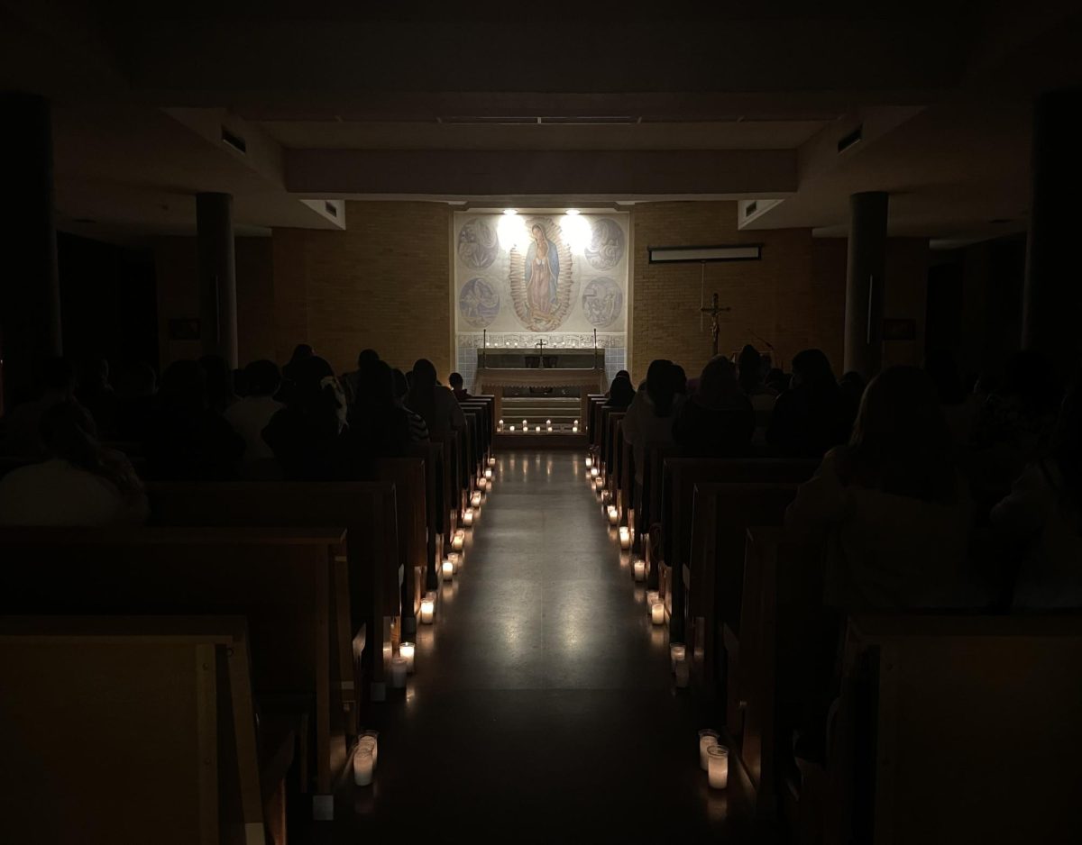 Benedictine College women gather in Abbey Crypt for Candlelight Mass.