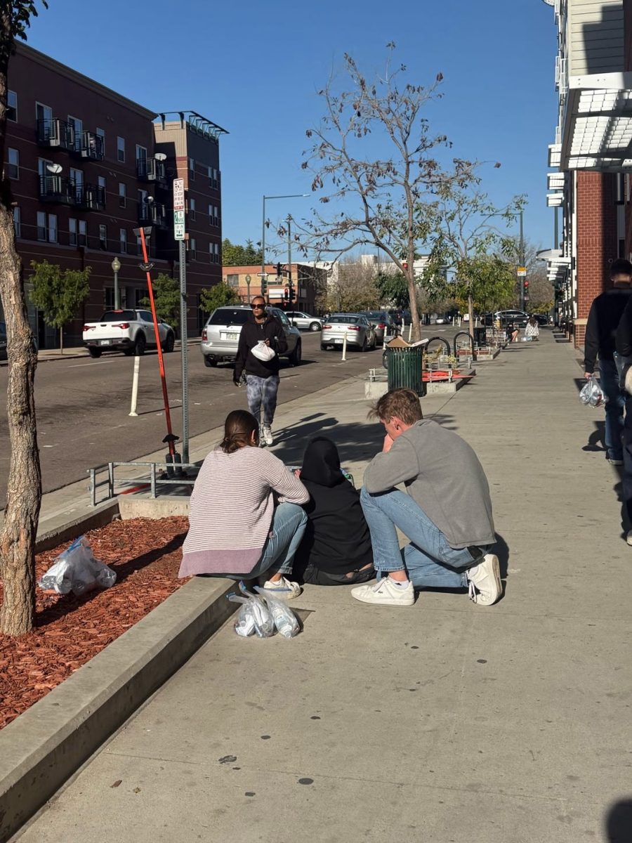 Jess Bazaldua and Anthony Blum doing homeless ministry on the streets of Denver, Colorado.