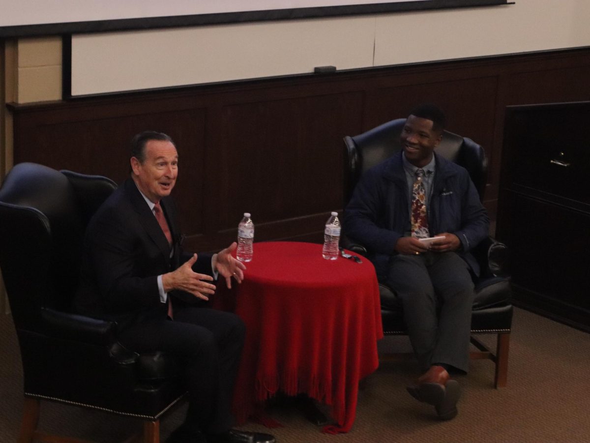President Minnis engaging in exciting discussion with Corban Graham.