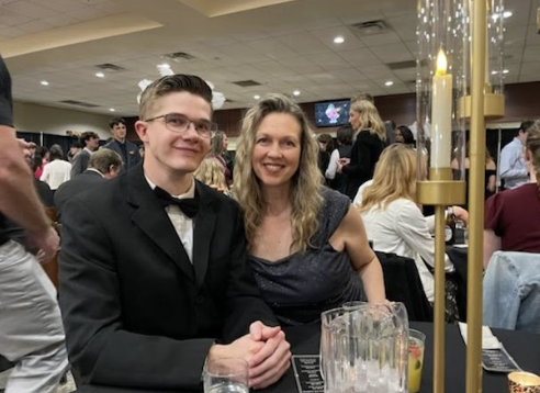 Micah Wallace and his mother enjoy the MSFD Banquet.